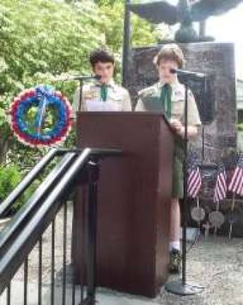 Milford honors those who sacrificed all Star Scout Terrance Ring and soon-to-become First Class Scout Andrew Phillips read the names of the fallen (Photo by Frances Ruth Harris)