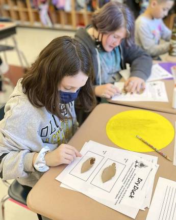 DVES students study animal adaptations Ariel Ostrout, Allyson Masone, Jordan Delahoz (Photo by Peggy Snure)