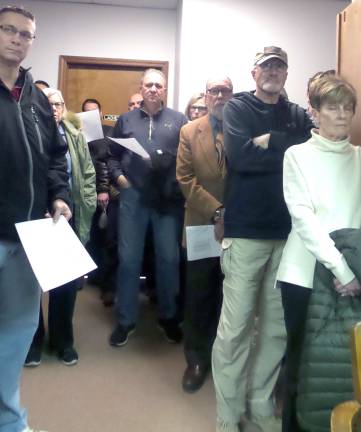 Tell us the worst: Public asks about new housing development proposed for Milford Some people stood outside the meeting room for two hours (Photo by Frances Ruth Harris)