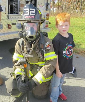 Firefighter Paul Zorn with Kieran Kuhn