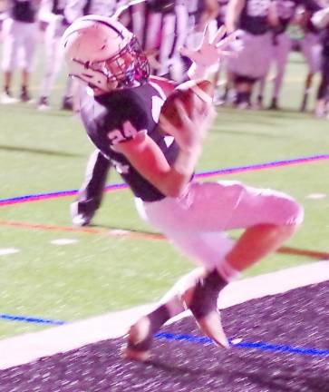 Delaware Valley tight end Cooper Kidd catches the ball to score a touchdown in the first half.