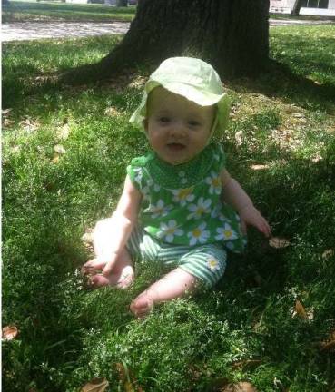 Oh Baby, it's Spring! Baby Photo Contest Photo, Julia Doellinger of Chester Kate on the lawn in Battery Street Park in Downtown Charleston, SC at 7 months old.