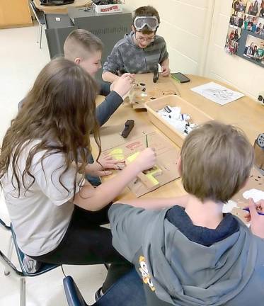 Young engineers make toys for holiday drive