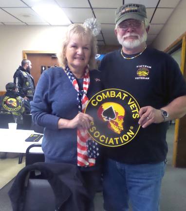 Community gathers to commemorate Veterans Day Vietnam combat vet John Sedlock and his wife, Marilyn