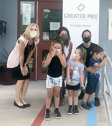 At the Center for Developmental Disabilities (CDD) in Milford (from left): Pre-K scholarship recipients Julee-Anna Ward, Skylar Scrofe and Robert Gibbons with (from Left) Greater Pike’s Executive Director Jenni Hamill, CDD’s Family Support Specialist Vicki M. McCabe , Robert’s mom, Lucia Shrag (Photo provided)