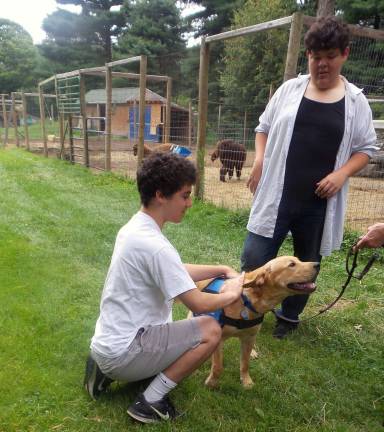Keeping up with Benni Benni enjoys some good petting at Country Ark Farm (Photo by Frances Ruth Harris)