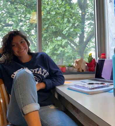 Isabella Granada at the desk in her Penn State dorm room (Photo provided)