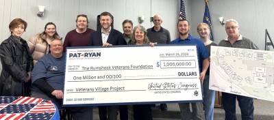 Rep. Pat Ryan presents the Rumshock Veterans Foundation with a check for $1 million.