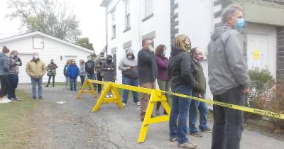 Voting in Milford Borough was crisp, with line of 20 people waiting. Officials said 200 people had voted by 11 a.m. (Photo by Frances Ruth Harris)