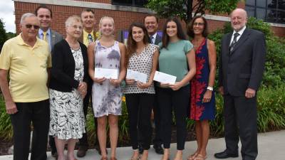 Front row (from left): parents of the late Cathy Collins, Bill and Mary Theobald; Paige Barillo, Cathy Collins Scholarship recipient; Hannah Smith; Isabella Calabrese, Dr. Howard R. and Marian C. Patton Scholarship recipients. Back row: Charles Curtin, Honesdale National Bank; Jamie Collins, husband of the late Cathy Collins; David Hoff, CEO, Wayne Memorial Hospital; Penny Gustin Friese and Jack Dennis, executive director, Wayne Memorial Health Foundation. Missing from photo is Ashley Davis, Dr. Howard R. and Marian C. Patton Scholarship recipient.