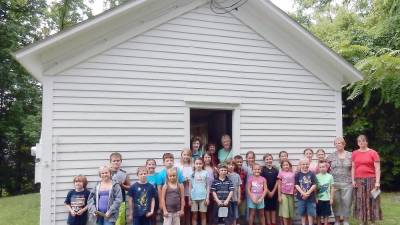 History summer camp is held at the one-room schoolhouse at Price’s Switch, which remains just as it was when it closed in the 1950s. (Photo courtesy of Vernon Historical Society)