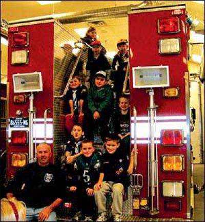 Scouts get lessons at fire department Scouts get lessons at fire department