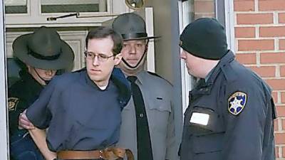 Eric Frein is escorted out of the Pike County Courthouse in Milford in 2015 (Photo by Jeff Sidle)