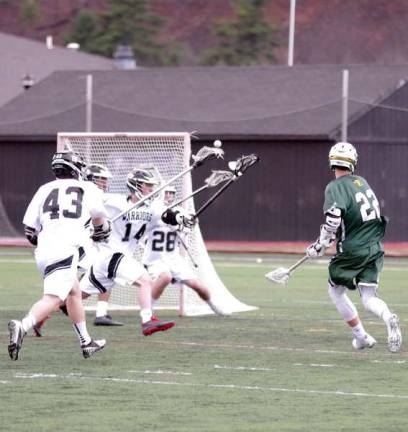 A weekend of DVHS lacrosse Delaware Valley Warriors raise their crosses in an attempt to stop an incoming ball shot from an Emmaus Hornet
