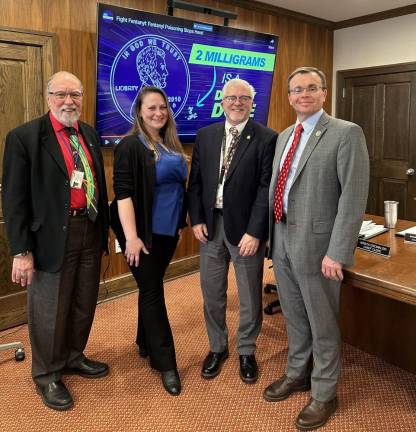 L-R: Commissioner Tony Waldron, Shannon Wisniewski, Commissioner Matthew Osterberg, and Pike County District Attorney Raymond Tonkin.