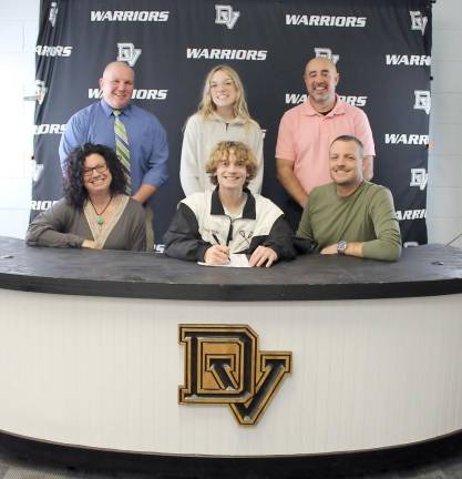 Pictured left to right: front row – Mrs. Kelly Walter, senior Shawn Santise and Mr. Michael Santise.