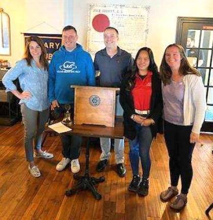 Rotary inducts new members Jamie Dyksta, Dan Connelly, Shaun Burger, Flora Connelly, and Candace Mahala.