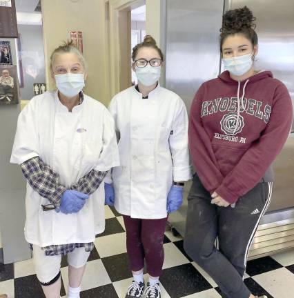 Grandma Goldsack (left) with helpers Maritza Jahn (center) and Azaleyah Felix (Photo by Marilyn Rosenthal)