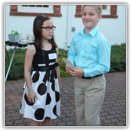 Milford student turns shell casings into jewelry to raise funds for veterans Chloe Clancy and award recipient Sam Wilshinsky.