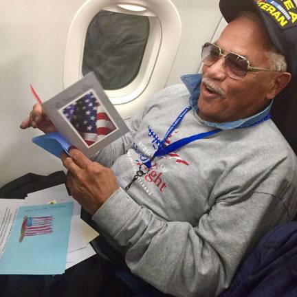 Getting in-flight mail is a favorite part of the Honor Flight