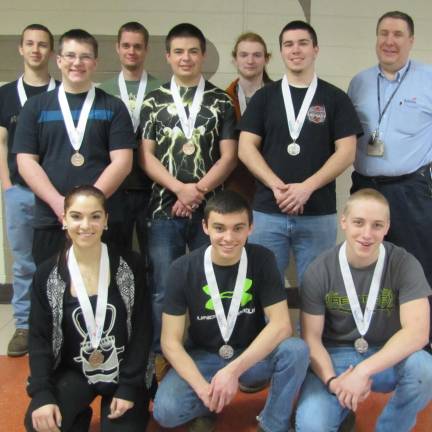 Career and Technical Students win 10 medals in competition The medalists of the 2015 Skills USA Club, back row (from left): Sean Wagner, Richard Wardlaw, John Rivera, Adviser Michael Dobrzyn; center: Jordan Cunningham, Brandon Plumley, Michael DaSilva; front: Kimberly Koncelik, Dominick Divirgilio, Justin Tants (Photo provided)