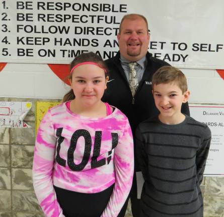 Celebrating Students of the Month Band Students of the Month: Gabriella Lebron (Beginning Band), Max Kiederer (Cadet Band) with DVES Principal Aaron Weston.