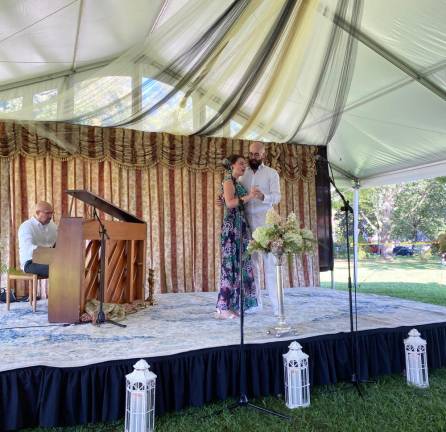 Emily Margevich and Benjamin Dickerson with Jose Melendez at the piano.