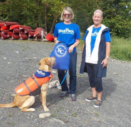 Keeping up with Benni Benni in his life vest, ready for some river action (Photo by Frances Ruth Harris)