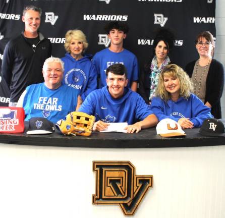 Senior Aidan Hyams (bottom row center) with his parents, Mitchell and Jennifer Hyams, and (back row l-r) head coach Sean Giblin, grandmother Peggy Grundstrom, brother Evan Hyams, high school principal Dr. Nicole Cosentino , and guidance counselor Molly Blaut.