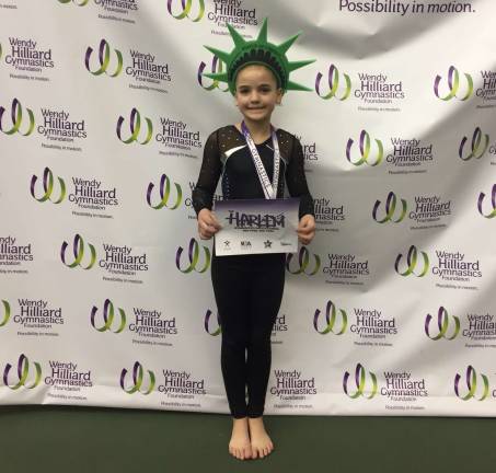 Gymnast Fiona Ring qualifies for state championship Gymnast Fiona Ring qualifies for state championship
