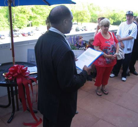 Healing Garden created at St. Joseph’s Place Guests assembled in the Healing Garden for a blessing by Father Vincent Odikanoro and the official ribbon cutting ceremony.