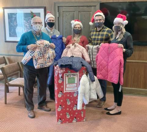 From left: Pike County Commissioner Matthew Osterberg; Michael Lamoreaux, P.E., Principal, McGoey Hauser &amp; Edsall; Stephanie Everson, Case Manager, Family Promise; Robert Ruiz, Director of Human Services; and Kayla Orben, Human Services Coordinator (Photo provided)