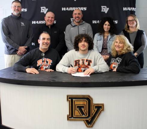 Pictured left to right: front row: Paul Weinrich, senior Paul Weinrich and Kristen Weinrich; and in back: Head football coach Keith Olsommer, head lacrosse coach Jeff Krasulski, assistant lacrosse coach Dan Gonzalez, high school principal Nicole Cosentino and guidance counselor Jessica Favorito. Photo provided by Leslie Lordi/Delaware Valley High School.