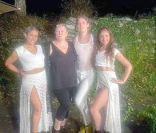 Backstage (from left): dancer Kristina Bermudez, choreographer/director Johanna LjungQvist-Brinson, and dancers John Trunfio and Abigail Dias (Photo by Alan Kaplan)