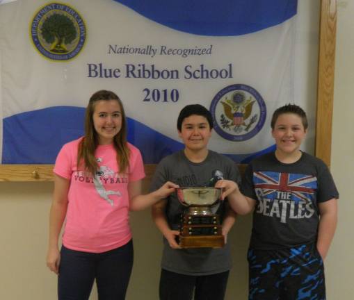DV spells 'success' at tristate bee From left: 2nd place, Skylar U'Glay, 8th grade; champio,n Darius Bermudez, 7th grade; 3rd place, Josh Caraballo, 6th grade (Photo contributed)
