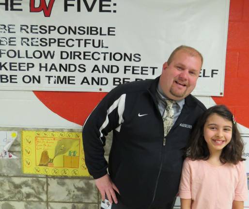Celebrating Students of the Month Chorus Student of the Month: Stella Weir with DVES Principal Aaron Weston.