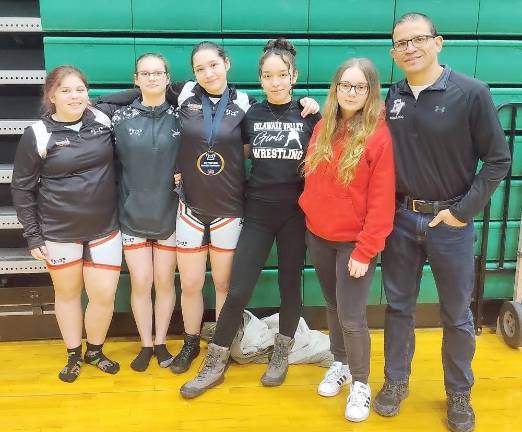 Delaware Valley Lady Warrior Wrestlers surpass all expectations in their first year From left: Victoria Depew, Danielle Eisloffel, Sarah Seltzer, Alia Narvaez-Wiener, Kaelyn Balbirer, Coach Evan Bates (Photo provided)