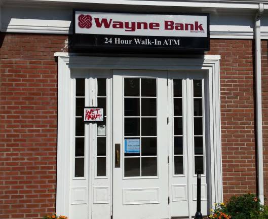 Police release video footage in Shohola ATM burglary The entrance to Wayne Bank in Shohola was repainted after the ATM machine was stolen.