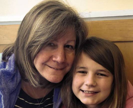 Mother Daughter Look A Like Contest Photo submitted by Kelly Eisenhardt of Sparta Kelly with her daughter Kathleen. "Recent picture taken while vacationing on Cape Cod."