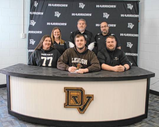 L-R Front: Misty Albaugh, Jacob Albaugh, Gary Albaugh. L-R Back: Guidance counselor Crystal Ross, assistant football coach Nick Quaglia, and high school Principal Mr. Lou DeLauro.