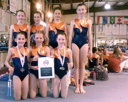 Giant gymnasts take first all around Garden Gator's Copper team, with their first place plaque, front row: Adelina Zahner and Marguertie Bysshe of Sparta, N.J., and Amanda LiCausi of Milford. In back: Torie Frisbie of Sandyston, N.J., Riley D'Allesandro of Sparta, Morgyn Witt of Newton, N.J., and Maddie Doherty of Lafayette, N.J.