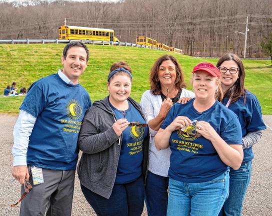 Principal Frank Ciaburri poses with staff members Gemma Lusardi, Cara Johnson, Marisa Wilson and Lisa Kaplan, who organized the event. (Photo by Nancy Madacsi)