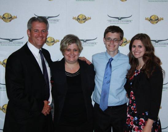 Tri-State Chamber of Commerce honors businesses Hall of Fame: Gray Parker Funeral Home (from left): Shaun and Lisa Parker and their children, Coleman and Jessica