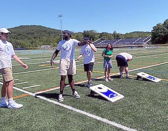 Unified Sports builds relationships on the field Fun on the Sparta turf with the football team and Unified Sports (Photo by Laurie Gordon)