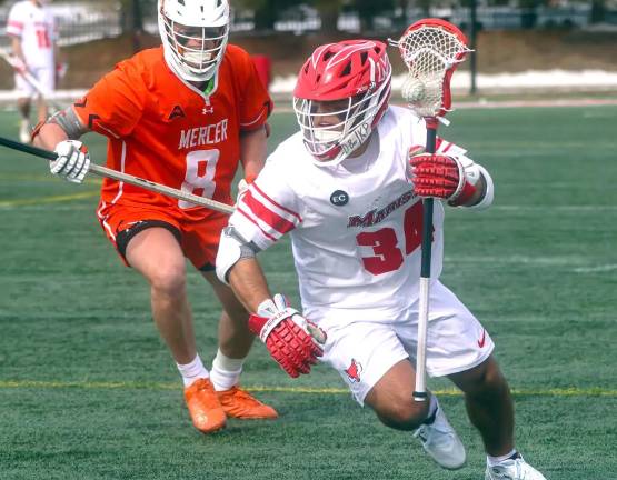 Collegiate Sports Roundup <b>Joshua Balcarcel (#34), a midfielder for Marist University. </b>