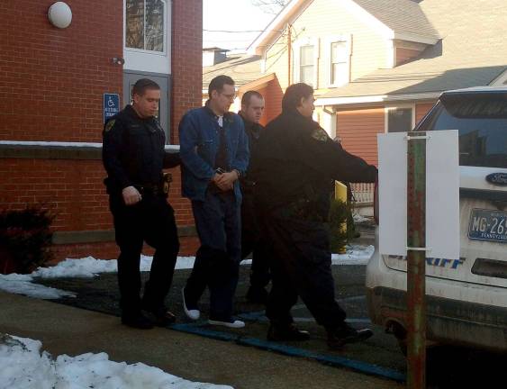 Frein trial approaches, with jury selection now underway Police officers lead Eric Frein out from the Pike County Courthouse after the pre-trial motions hearing last December. (Photo by Anya Tikka)