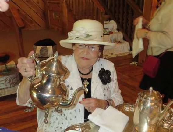 Modern Day Tea Party Photos provided Pictured is Annie Catalano, Milford Garden Club member.