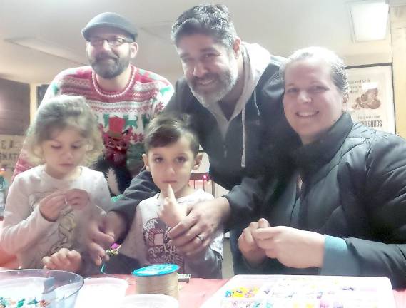 Wishes come true at 'An Old-Fashioned Milford Christmas' Front: Isabella, Matteo and Christiane Miranda; back: Tim Kelly and Antonio Miranda
