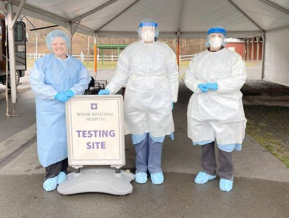 Wayne Memorial Laboratory Services staff at the Wayne County Fairgrounds, which will now test five days a week (from left): Angelica Jean-Philippe, Nancy O’Connell and Kim Bates