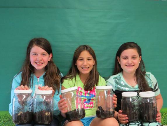 Worms, yuck! Photo provided Pictured from left: Hailey Degli-Angeli, Jada Casanova and Alexandra Manazza are all fifth graders in Ann Connell's Delaware Valley Elementary School class.